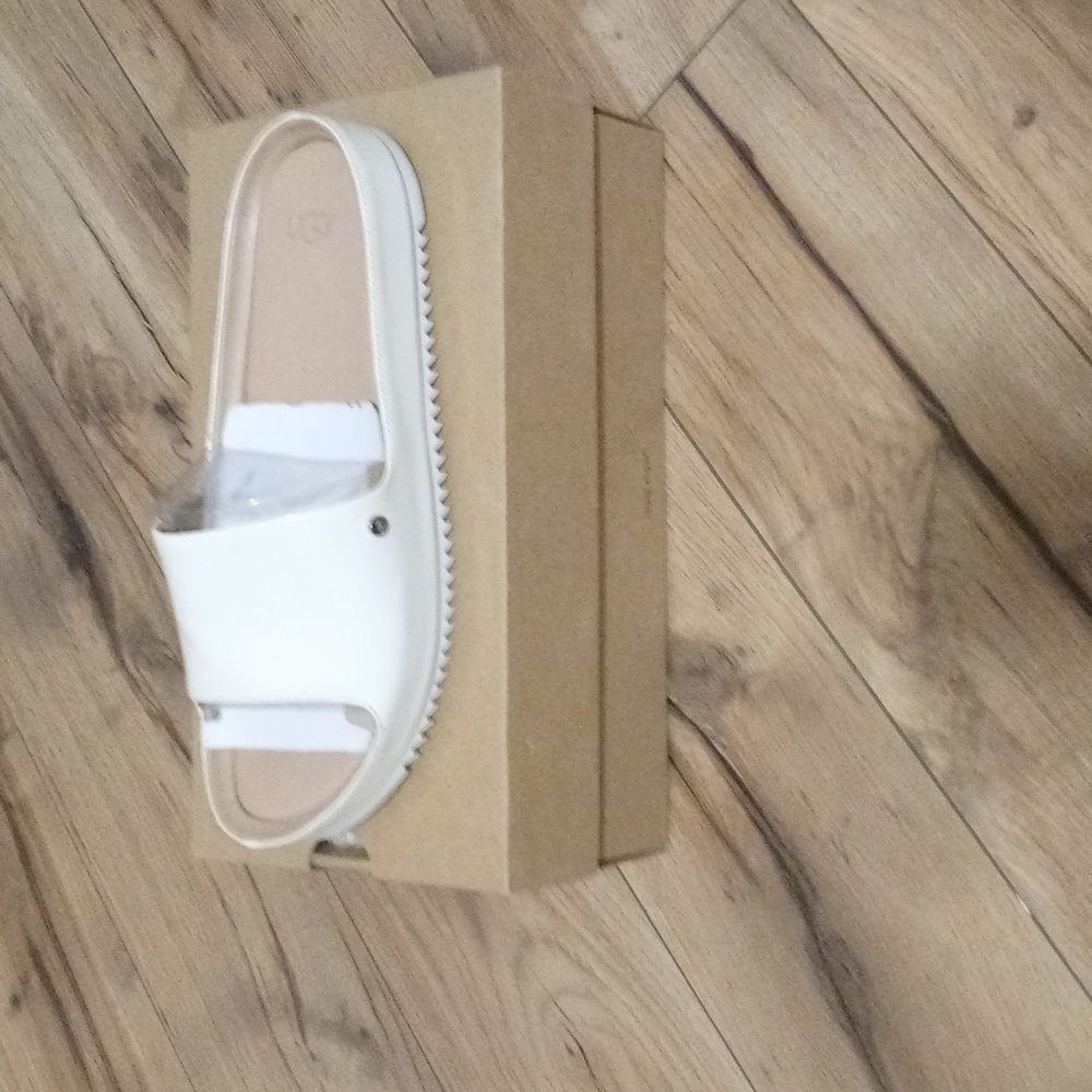 Uggs Sandals worn them twice still in excellent condition still in the box